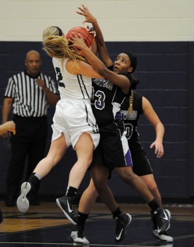 Marshelle Franklin tries to steal the ball from Kate Sescleifer.