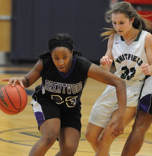 Marshelle Franklin dribbles past Catalina Cuevas of Whitfield in the first period.