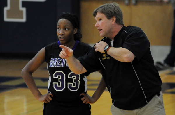 Head coach Chris Jones directs Marshelle Franklin in the first period.