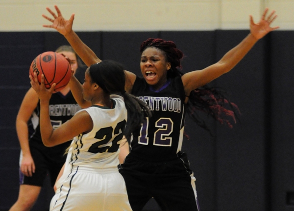Air'shay Lampkin (right) puts the heat on Jessica Scales of Whitfield.