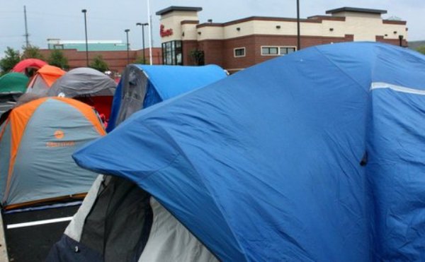 About 30 tents were pitched in the parking lot by Wednesday evening.